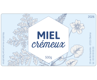Étiquette rectangulaire bleu clair pour miel crémeux, avec hexagone blanc central et illustrations de fleurs